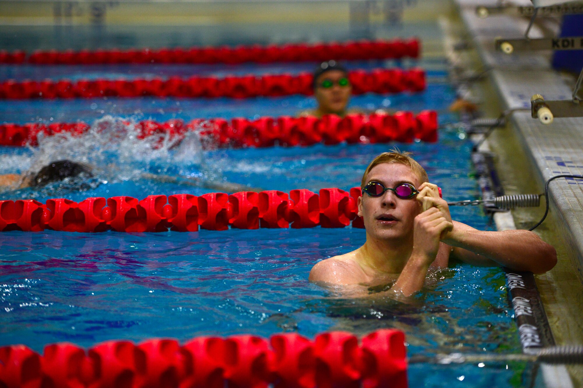 Joint Base Elmendorf-Richardson Athletes review their scores during the second intramural swim meet competition at Buckner Physical Fitness Center, Oct. 28, 2016. Thirty people participated in 28 events during the final swim meet of the year. Scores from both meets were combined to determine first, second and third place winners. 