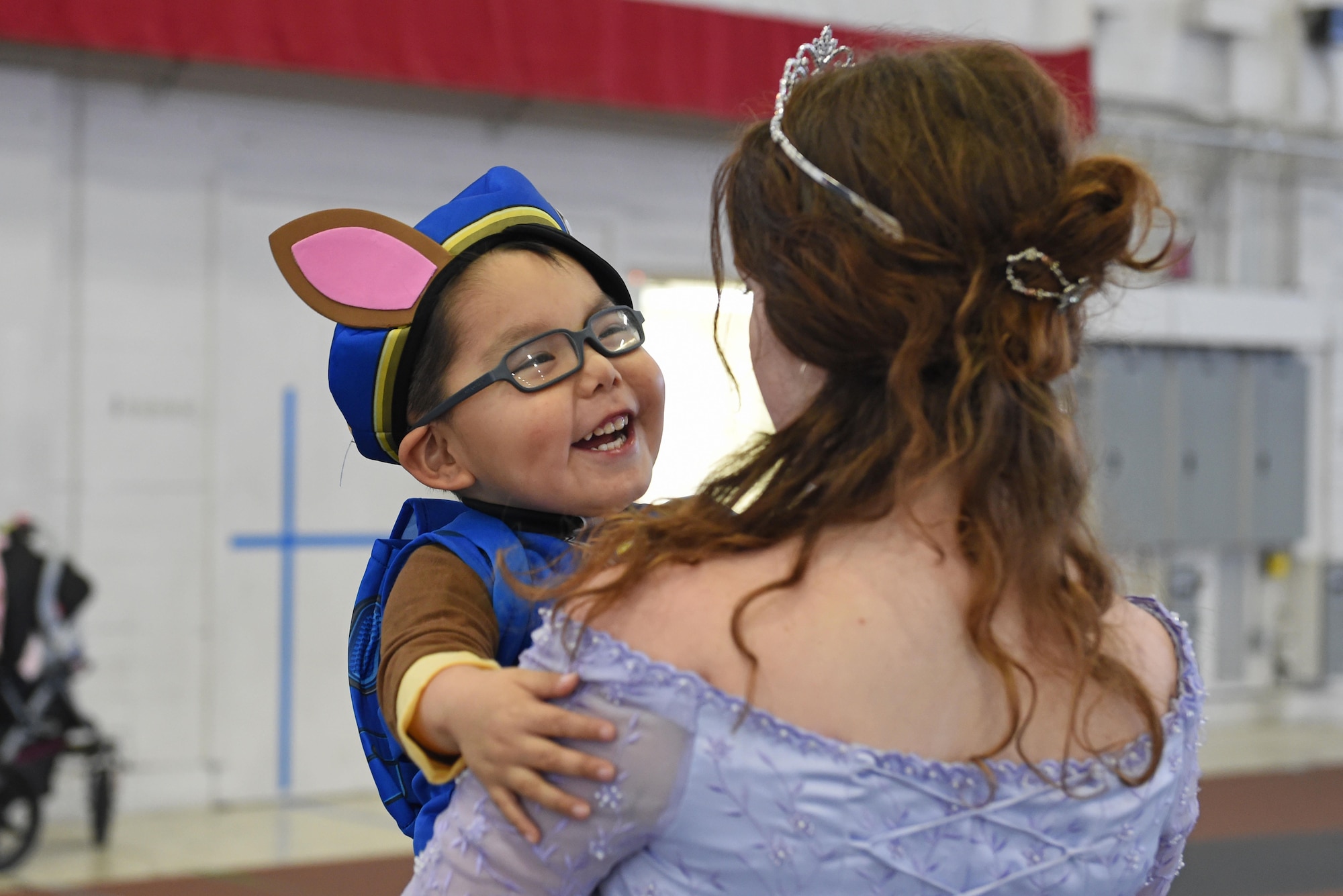 Noah Bechand, 3, waits for the start of a costume fun run in Hangar 5 at Joint Base Elmendorf-Richardson, Alaska, Oct. 28, 2016. The run was a mile long and prizes were awarded to the top three finishers as well as best adult and child costumes. (U.S. Air Force photo by Airman 1st Class Valerie Monroy)