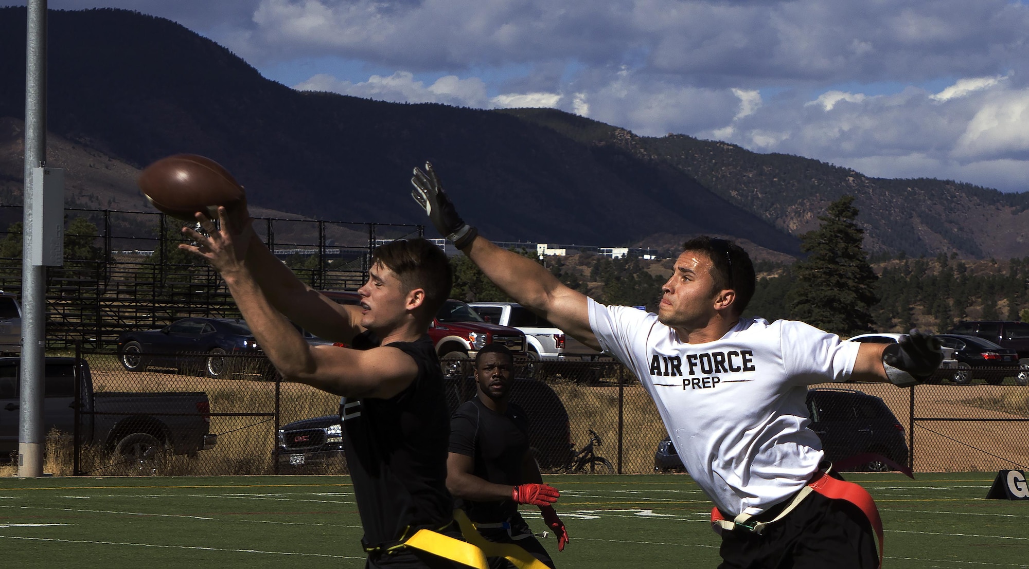 Jack Van Burk, F.E. Warren Air Force Base, Wyo., intramural flag football team defensive back, intercepts a pass intended for an Air Force Academy player during the Rocky Mountain Intramural Flag Football Tournament at the U.S. Air Force Academy, Colorado Springs, Colo., Oct. 29, 2016. Four teams from the bases in the Rocky Mountain area competed in the tournament. Warren won the tournament with a record of two wins and one loss. (U.S. Air Force photo by Senior Airman Brandon Valle)