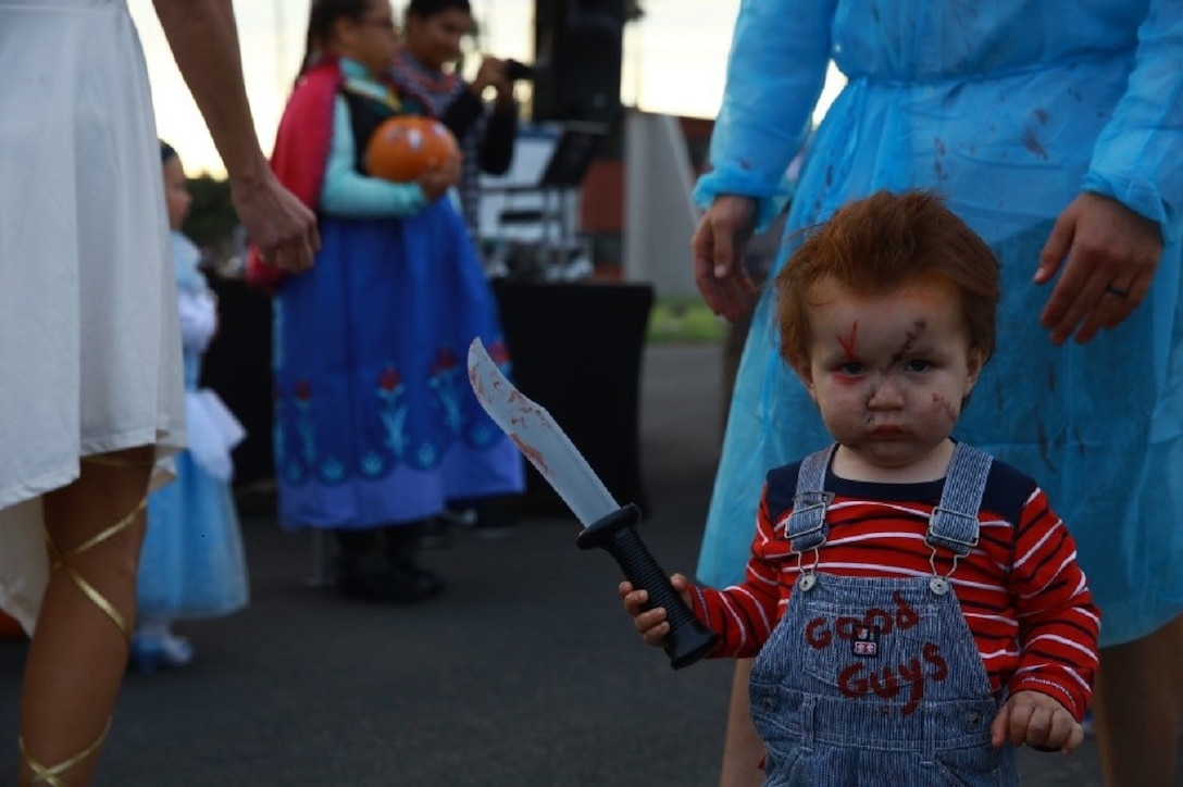 Families participate in “Trunk or Treat” at Marine Corps Base Camp Pendleton, Calif., Oct. 28, 2016. The event was hosted by I Marine Expeditionary Force Headquarters Group, and included trick or treating, games, a costume contest, and a free movie showing. (U.S. Marine Corps photo by Pfc. Robert Bliss)