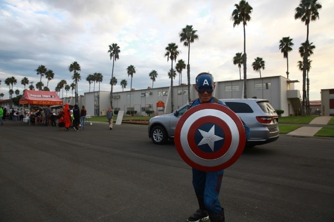 Capt. Brian Moeller, commanding officer, Headquarters Company, I Marine Expeditionary Force Headquarters Group, donned the stars and stripes during “Trunk or Treat” at Marine Corps Base Camp Pendleton, Calif., Oct. 28, 2016. The event included trick or treating, games, a costume contest, and a free movie showing. (U.S. Marine Corps photo by Pfc. Robert Bliss)
