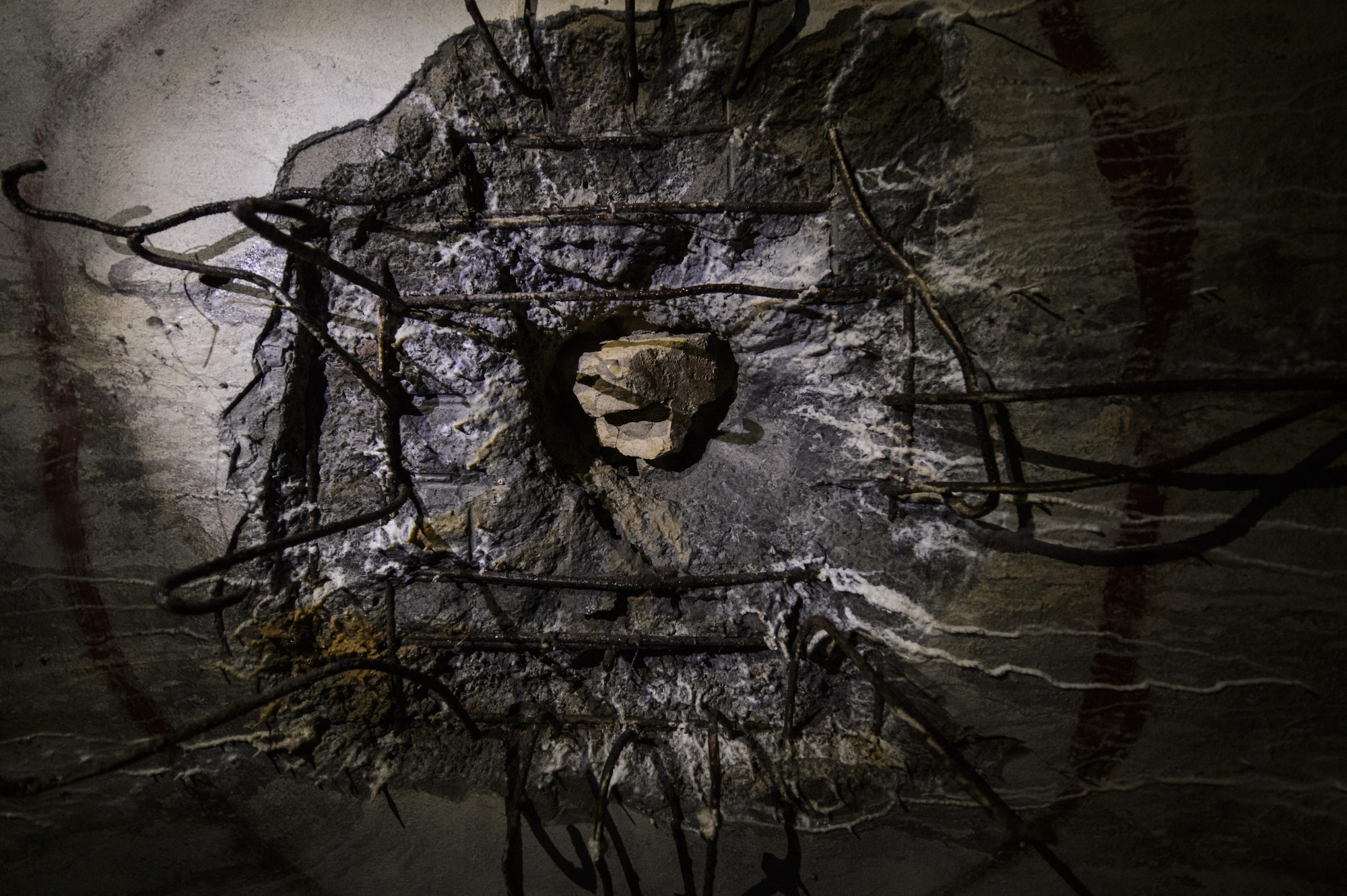 Damage to a bunker ceiling from a Roschling shell remains at Fort Aubin-Neufchateau, Belgium, Aug. 28, 2016. This weapon caused significant damage to the bunker, with only 30 percent of the bunker remaining accessible now. (U.S. Air Force photo by Staff Sgt. Jonathan Snyder/Released)