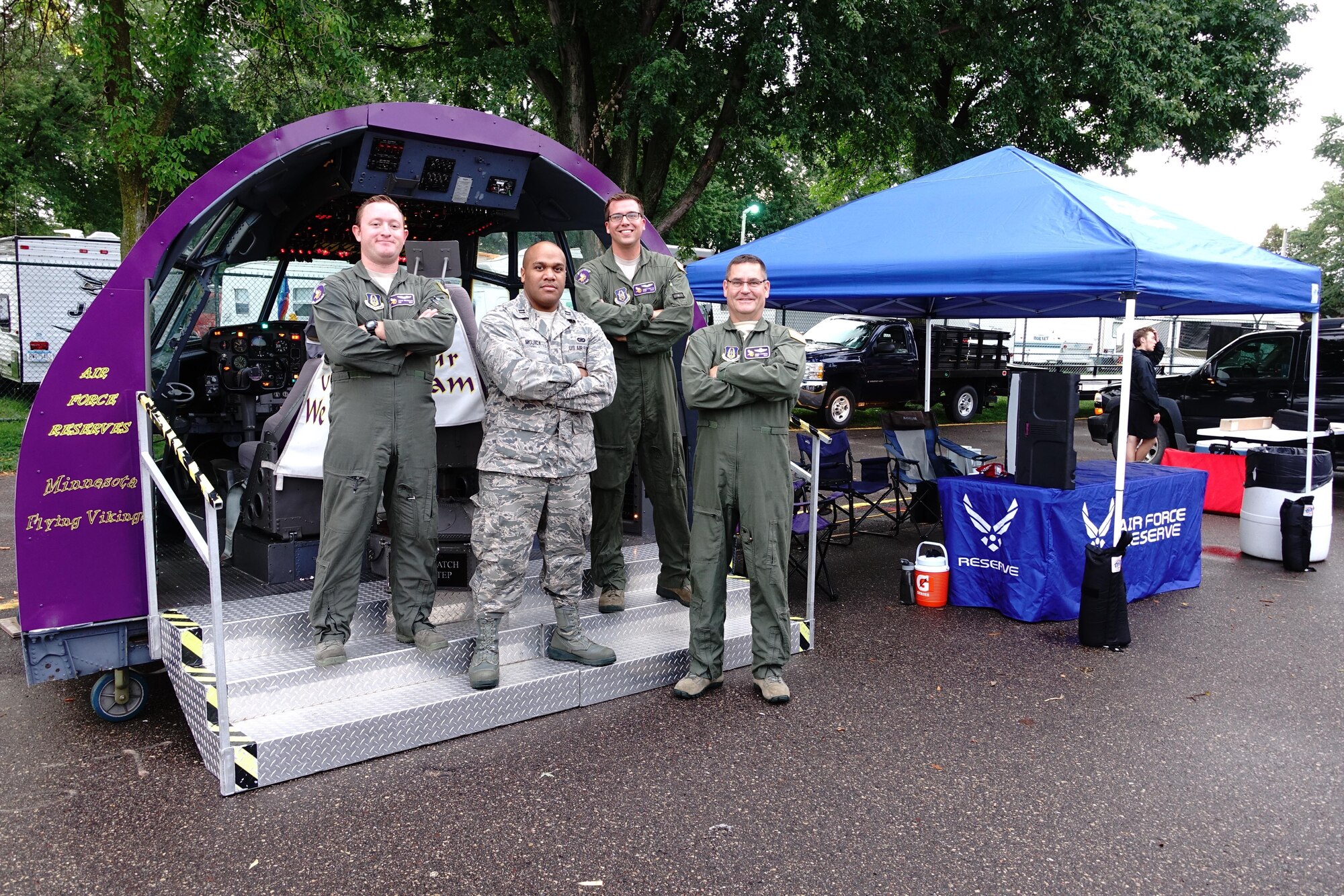 934th Airlift Wing members stand at the Minnesota State Fair Military Appreciation Day exhibit Aug. 30.