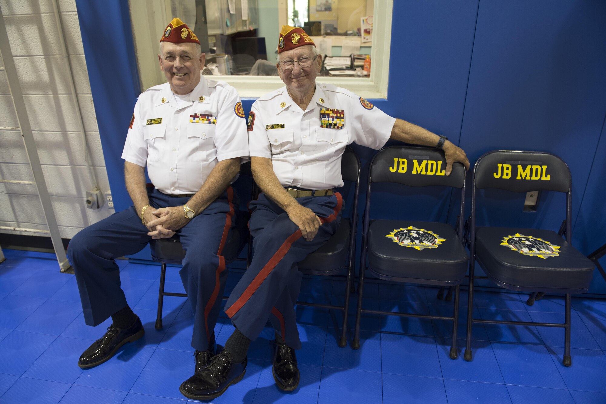 Bill Bargerhuff and William Wilson, Marine Corps League Burlington County Detachment #695 members, support the opening of the new Falcon Courts Youth Center Gym at Joint Base McGuire-Dix-Lakehurst, N.J., Aug. 31, 2016. The Marine Corps League joins together Marine Corps veterans and supports programs that promote the tradition of the Marine Corps. 