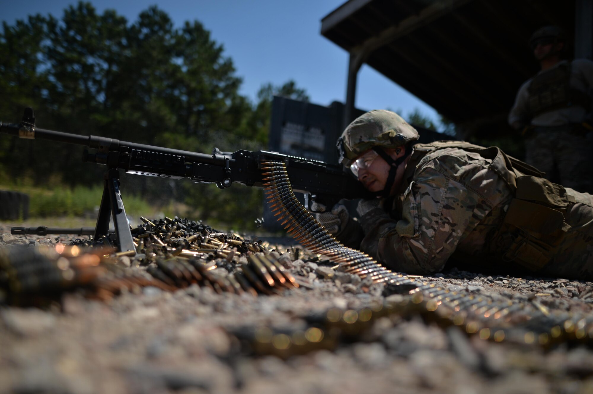 Staff Sgt. Robert Converse, a member of the 106th Rescue Wing Security Forces Squadron, fires a M240 machine gun during a training event at the Suffolk County Range in Westhampton Beach, N.Y., Aug. 24, 2016. Security forces members regularly train on the use and upkeep of these weapons, as well as the M249 squad automatic weapon, M4 carbine and M9 pistol. (U.S. Air National Guard photo/Staff Sgt. Christopher S. Muncy)