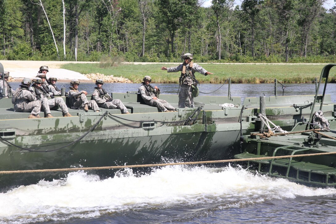 FORT MCCOY, Wis. - U.S. Army Reserve engineer Soldiers conducting bridging operations Aug. 21 during Combat Support Training Exercise 86-16-03 at Fort McCoy, Wis. (U.S. Army Reserve photo by Staff Sgt. Debralee Best)