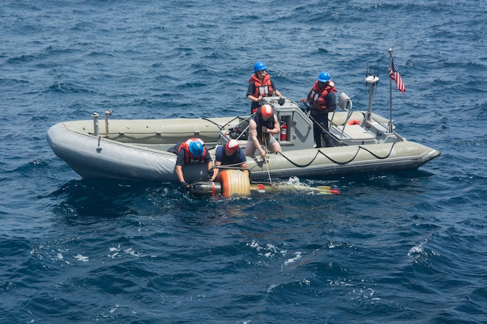 ARABIAN SEA (Aug. 26, 2016) Sailors assigned to the guided-missile destroyer USS Mason (DDG 87) retrieve a torpedo from the water during an anti-submarine warfare exercise. Mason, deployed as part of the Eisenhower Carrier Strike Group, is supporting maritime security operations and theater security cooperation efforts in the U.S. 5th Fleet area of operations. 
