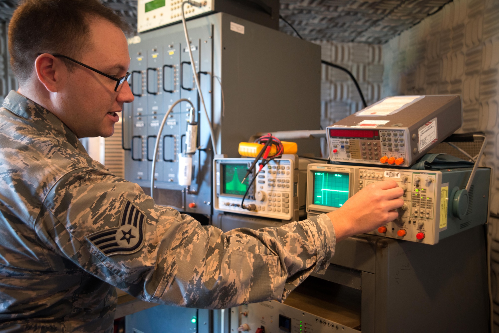 Staff Sgt. Scott Phillips, the NCO in charge of maintenance and data collection with the 6th Operations Support Squadron, begins testing the tactical air navigation system (TACAN) Aug. 29, 2016 at MacDill Air Force Base, Fla. The TACAN provides bearing and distance from an aircraft to the ground. (U.S. Air Force photo by Airman 1st Class Rito Smith)
