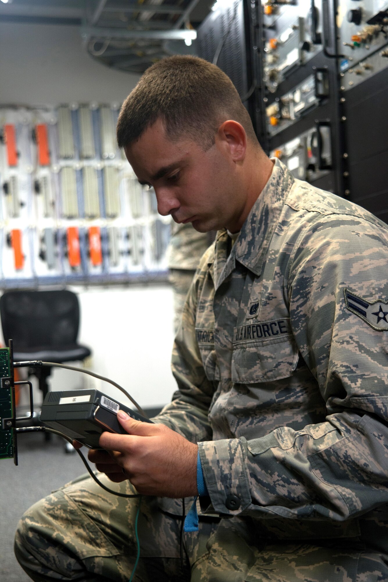 Airman 1st Class Sean Fitzpatrick, an airfield systems technician with the 6th Operations Support Group, repairs radio equipment Aug. 29, 2016 at MacDill Air Force Base, Fla. Airfield systems technicians maintain radio equipment allowing contact between the air traffic control tower and pilots. (U.S. Air Force photo by Airman 1st Class Rito Smith)