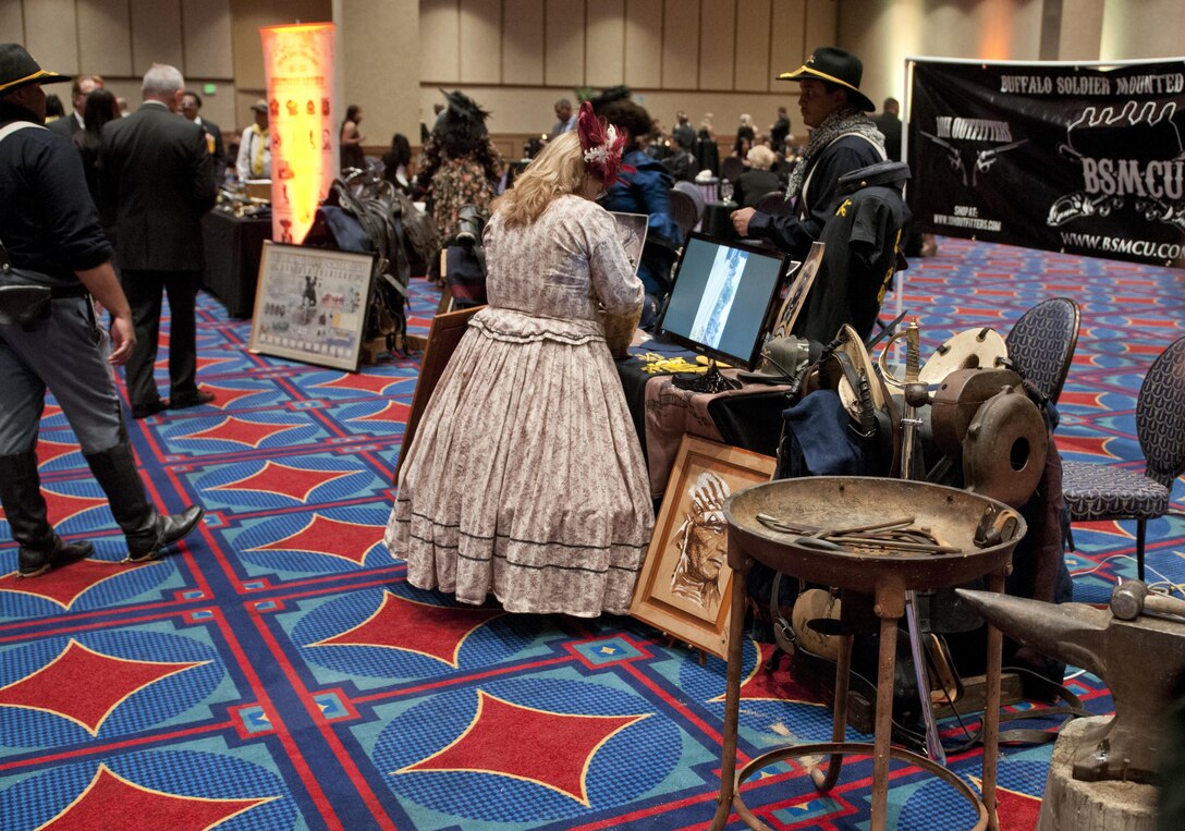 Artwork, memorabilia and Buffalo Soldier reenactors from the Buffalo Soldier Mounted Cavalry Unit were part of the historical reception at the Black Chamber of Orange County’s Annual Banquet at the Disneyland Hotel August 27, 2016, in Anaheim, Calif. The banquet, held annually, highlights a black history theme each year. This year’s theme was the legacy of Buffalo Soldiers, or Soldiers who served in segregated African-American units from 1866-1954. (U.S. Army photo by Sgt. 1st Class Alexandra Hays, 79th Sustainment Support Command).