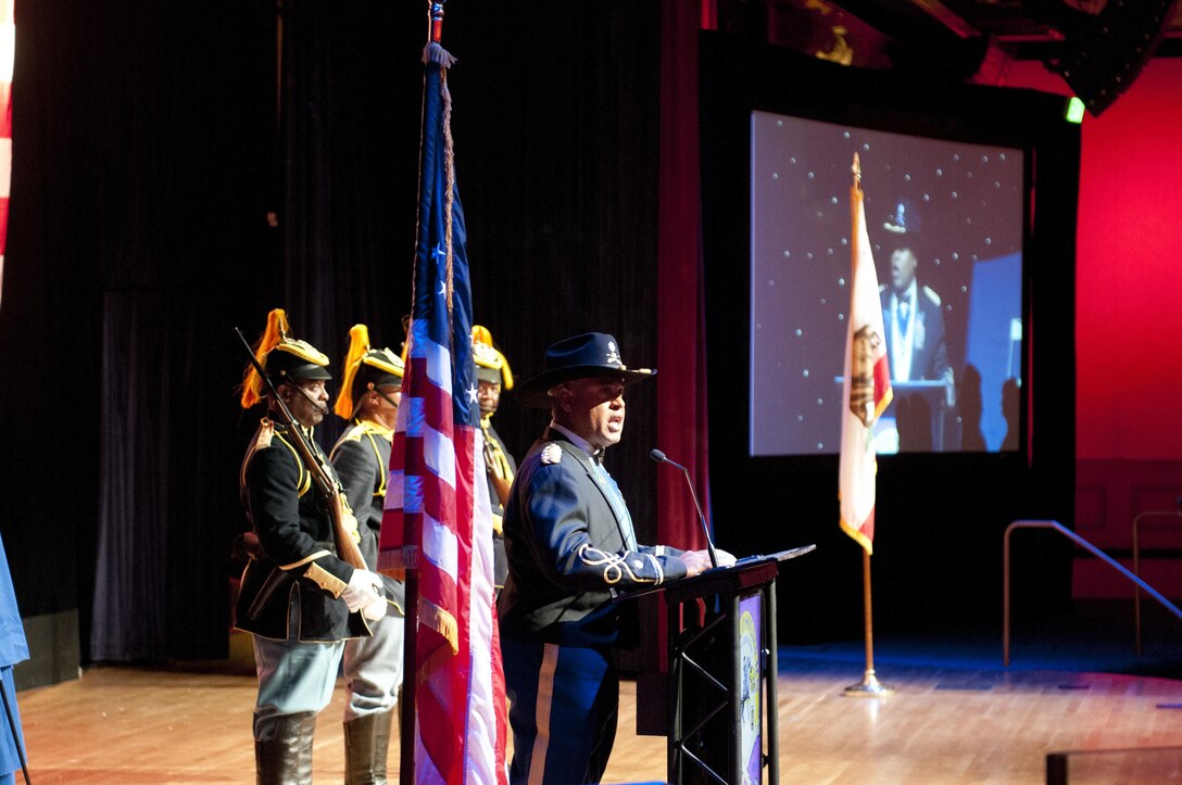 Lt. Col. Michael Johns leads the pledge of allegiance at the Black Chamber of Orange County’s Annual Banquet at the Disneyland Hotel August 27, 2016, in Anaheim, Calif. The banquet, held annually, highlights a black history theme each year. This year’s theme was the legacy of Buffalo Soldiers, or Soldiers who served in segregated African-American units from 1866-1954. (U.S. Army photo by Sgt. 1st Class Alexandra Hays, 79th Sustainment Support Command).