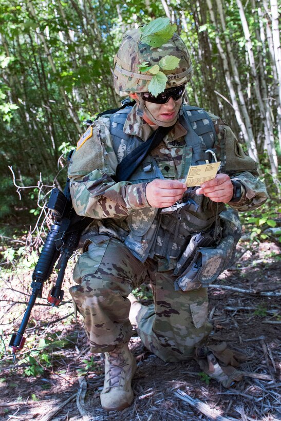 A soldier reads a medevac card during training at Camp Johnson, Colchester, Vt., Aug. 23, 2016. Army National Guard photo by Spc. Avery Cunningham