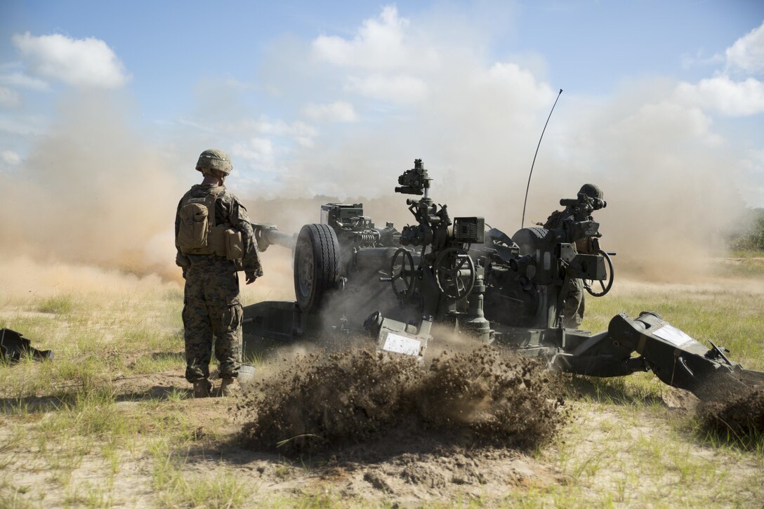 Marines with Echo Battery, 2nd Battalion, 10th Marine Regiment conduct a direct fire range during exercise Arrowhead Thunder at Fort Stewart, G.A., Aug. 15, 2016. The Marines conducted the range as part of their defensive engagement training. (U.S. Marine Corps photo by Lance Cpl. Victoria Ross)
