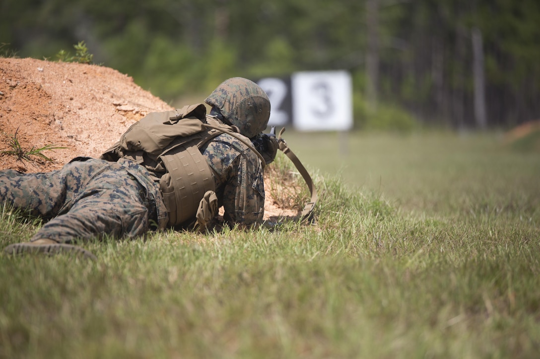Cpl. Justin Goodchild, a low altitude air defense gunner with the 2nd Low Altitude Air Defense Battalion, 2nd Marine Air Wing fires from the prone position during a live-fire range as part of exercise Arrowhead Thunder at Fort Stewart, G.A., Aug. 17, 2016. The Marines conducted the range as part of their air base ground security forces training to meet their Mission Essential Tasks. (U.S. Marine Corps photo by Lance Cpl. Victoria Ross)