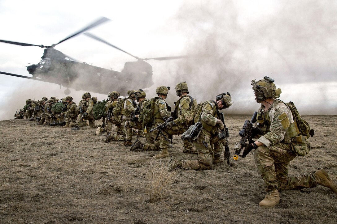 Army Rangers, assigned to 2nd Battalion, 75th Ranger Regiment, prepare for extraction from their objective during training on Fort Hunter Liggett, Calif., Jan. 30, 2014. Army photo by  Spc. Steven Hitchcock