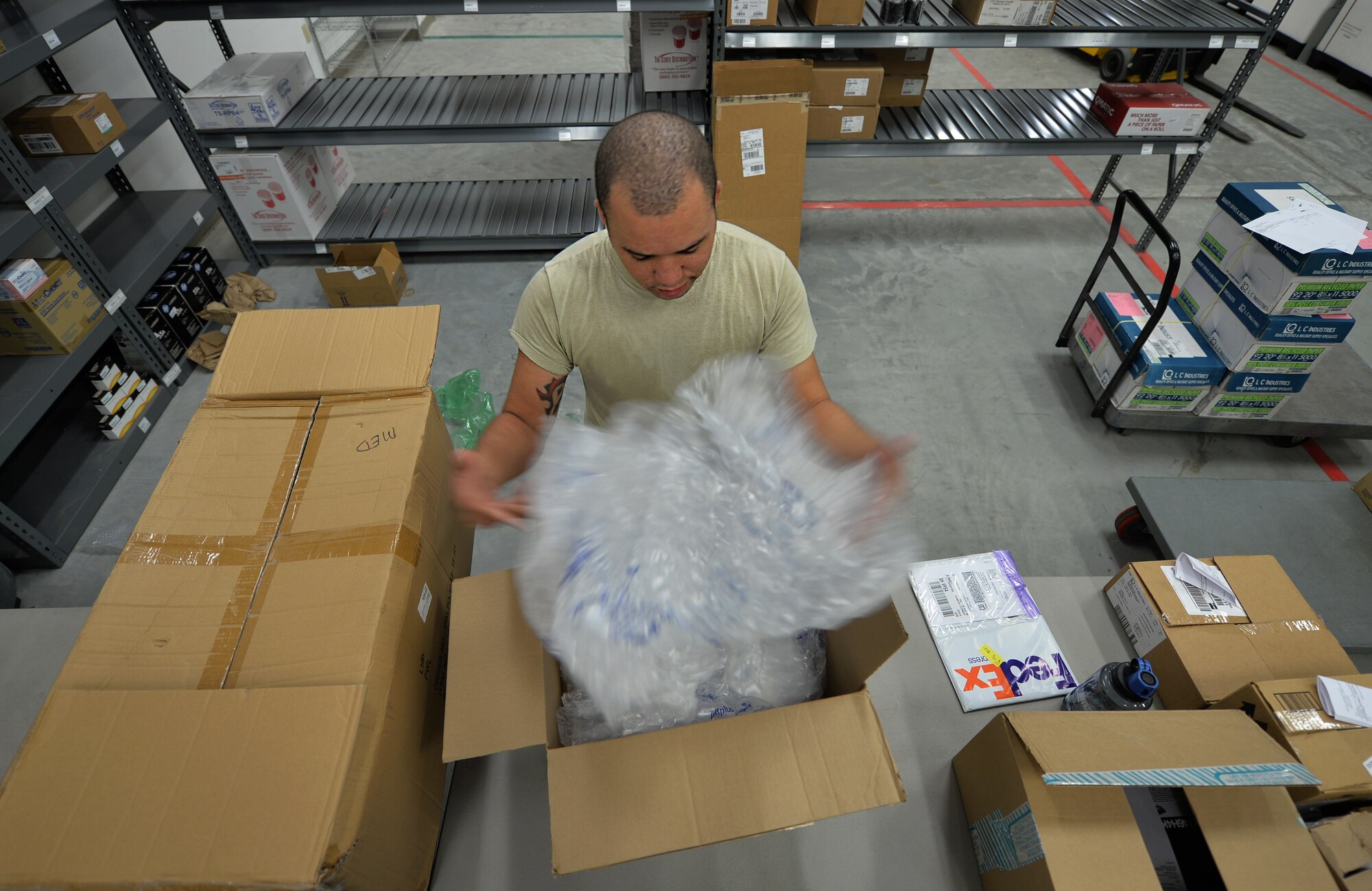 Senior Airman Christopher Lomax, a medical logistics journeyman assigned to the 1st Special Operations Medical Support Squadron, unpacks medical supplies at Hurlburt Field, Fla., Aug. 30, 2016. Medical materiel specialists ensure medical facilities have medications, supplies and equipment needed to sustain the force. (U.S. Air Force photo by Senior Airman Andrea Posey)