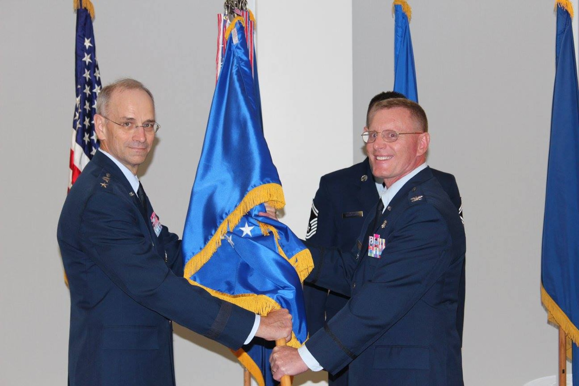 Lt. Gen. (Dr.) Mark Ediger, the Air Force Surgeon General, passed command of the Air Force Medical Support Agency to Col. Dean Borsos during a change of command ceremony Aug. 30 at the Defense Health Headquarters in Falls Church, Va. Borsos assumed command of AFMSA from Brig. Gen. James McClain.  