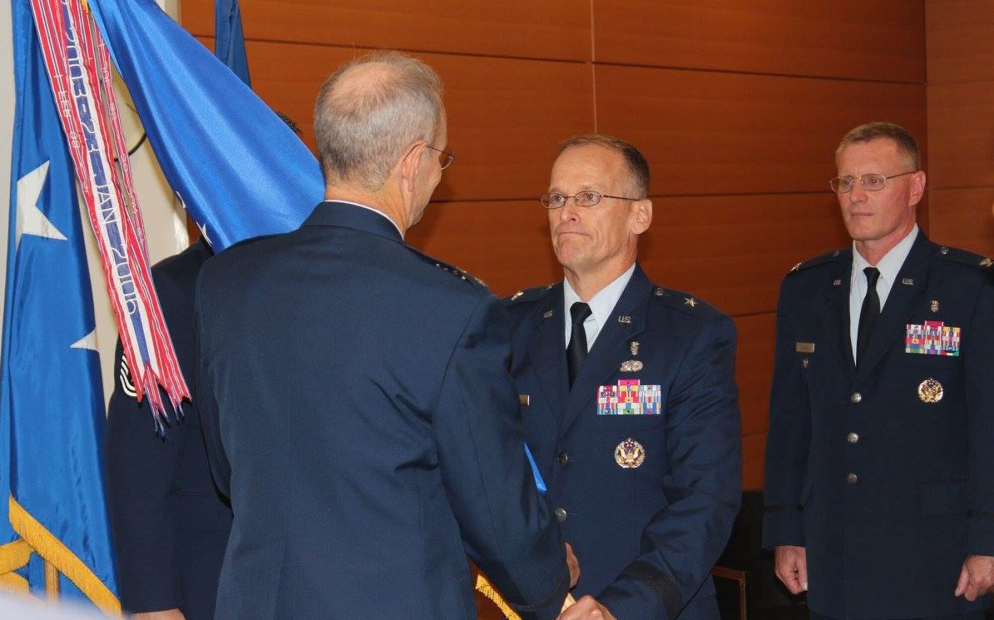 Lt. Gen. (Dr.) Mark Ediger, the Air Force Surgeon General, passed command of the Air Force Medical Support Agency to Col. Dean Borsos during a change of command ceremony Aug. 30 at the Defense Health Headquarters in Falls Church, Va. Borsos assumed command of AFMSA from Brig. Gen. James McClain.  