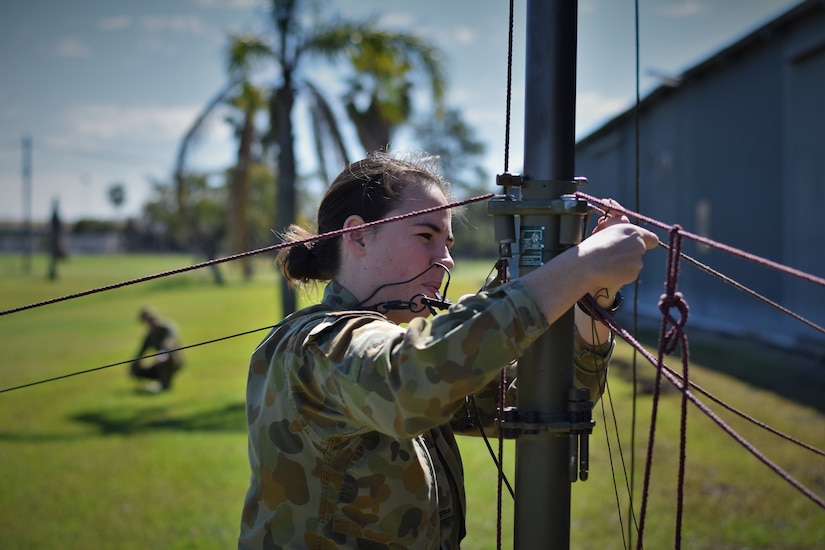 Australian Army Signalman Madallene Cooper sets up a high-frequency radio antenna at Damascus Barracks in Brisbane, Australia, during a field training exercise as part of Exercise Pacific Endeavor 2016, Aug. 28, 2016. DoD photo by Air Force Master Sgt. Todd Kabalan