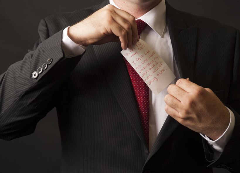 An Airman poses for a Suicide Prevention Month photo at F.E. Warren Air Force Base, Wyo., Aug. 31, 2016. September is Suicide Prevention Month where different organizations across the world will raise awareness and promote information and resources to help prevent suicides. (U.S. Air Force photo by Airman 1st Class Breanna Carter)