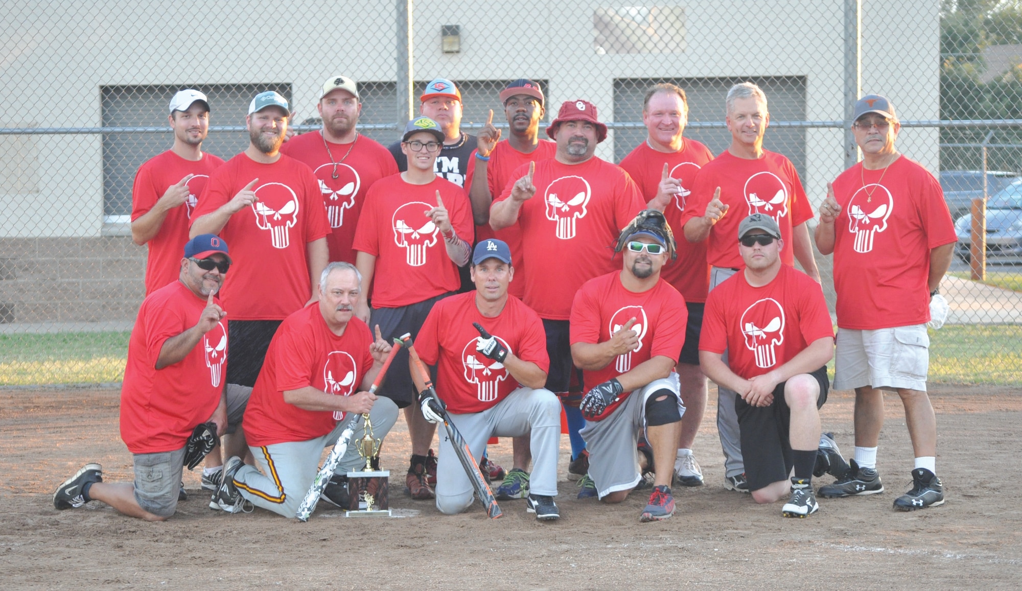 The 2016 Tinker Air Force Base intramural softball champions – Center Mass – show off their trophy Monday at Champ Field. The entire team, in alphabetical order, includes Chris Baker, Ewanee Benson, Craig Borrego, Told Colston, Jonathan Cody, Brian Crowe, Tyler Davis, Logan Edens, Donnie Galt, Ryan Gibbs, Robert Hansen, Willy Michael, Shaun Nickell, coach Joe Sanchez, Eric Szymanski, Mark Upchurch, Jimmy Williams, Buddy Walton and Johnny Woodring. (Air Force photo by John Parker)