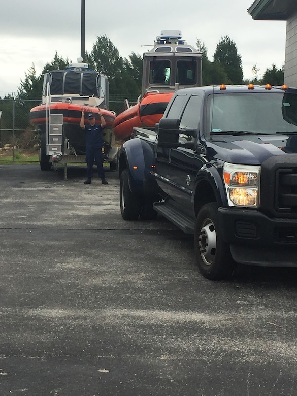 Coast Guard Fireman Jarod W. Shurack, a crew member at Coast Guard Station Yankeetown, Fla., parks the station's 27-foot utility boat at Florida Fish and Wildlife Conservation Commission's Crystal River, Fla., facility, Aug. 31, 2016. Station personnel relocated the boats in preparation for then-Tropical Storm, now Hurricane Hermine, and reminded all boaters that during the height of a storm rescue response may be degraded. Coast Guard photo