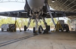 U.S. Marines assigned to Marine Fighter Attack Squadron (VMFA) 122 prepare to lower an F/A-18C Hornet during Southern Frontier at Royal Australian Air Force Base Tindal, Australia, Aug. 31, 2016. In preparation for departure from Australia, the squadron performs maintenance on all aircraft to ensure they are ready to make the long flight home. Southern Frontier is a three week unit level training that helps pilots gain experience and qualifications in low-altitude tactics, close air support, and air ground, high explosive ordnance delivery. 
