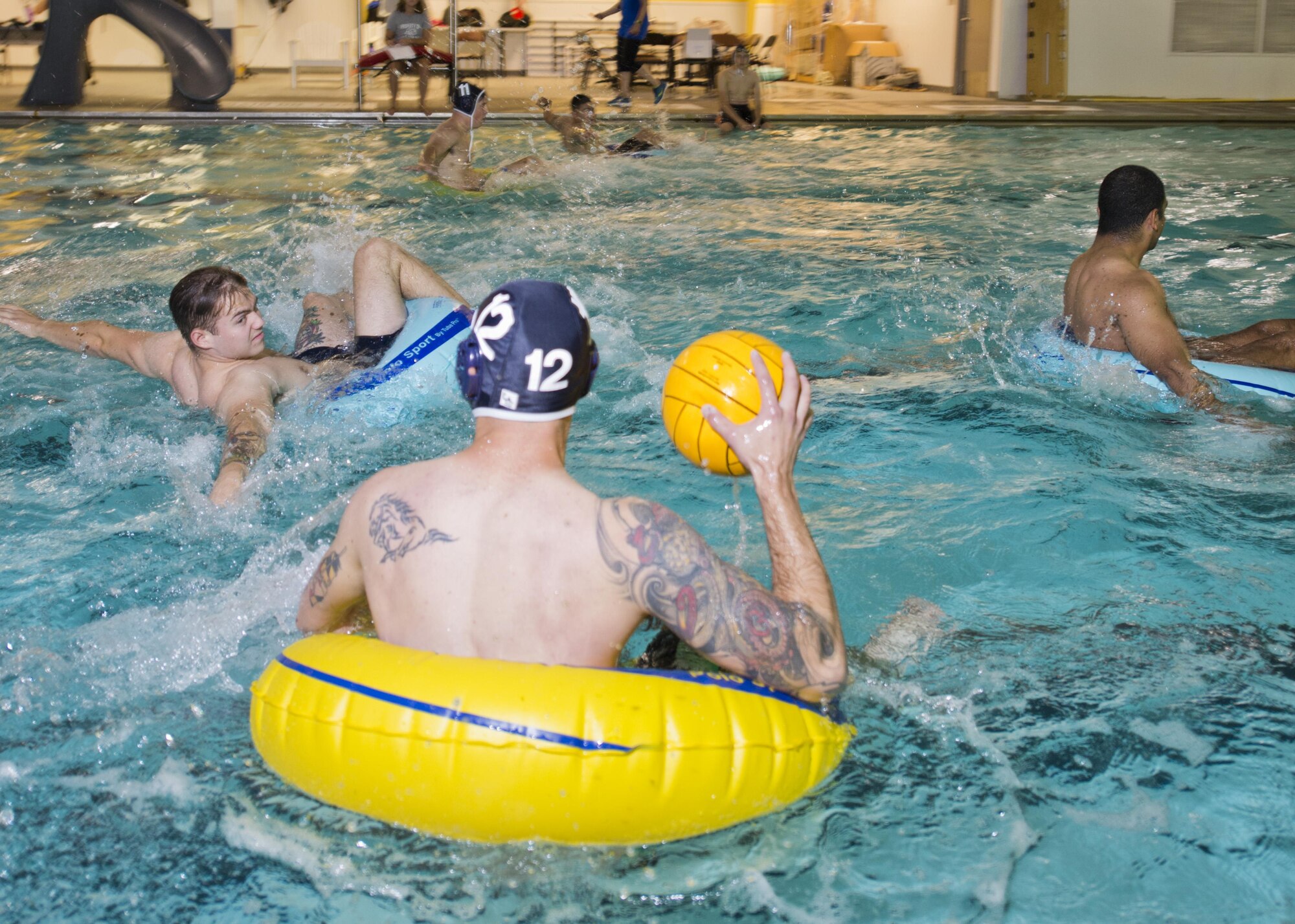 Team Minot Airmen compete in inner tube water polo during the Summer Games at Minot Air Force Base, N.D., Aug. 30, 2016. More than 300 Airmen competed in this year’s Summer Games for the coveted Commander’s Trophy. (U.S. Air Force photo/Airman 1st Class J.T. Armstrong)