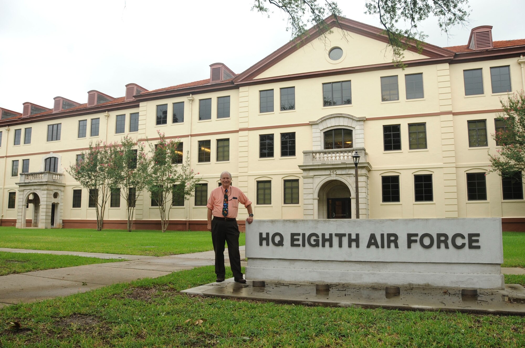 Ed Wempe, technical director for Eighth Air Force Intelligence Directorate and the 608th Air Operations Center ISR Division, stands out front of the Headquarters Mighty Eighth building at Barksdale AFB, La., Aug. 15, 2016. Barksdale is where Wempe retired from active duty and remained as a civil servant within the Intelligence career field until his retirement Aug. 18, 2016. (U.S. Air Force photo by Amn Alexis Schultz)
