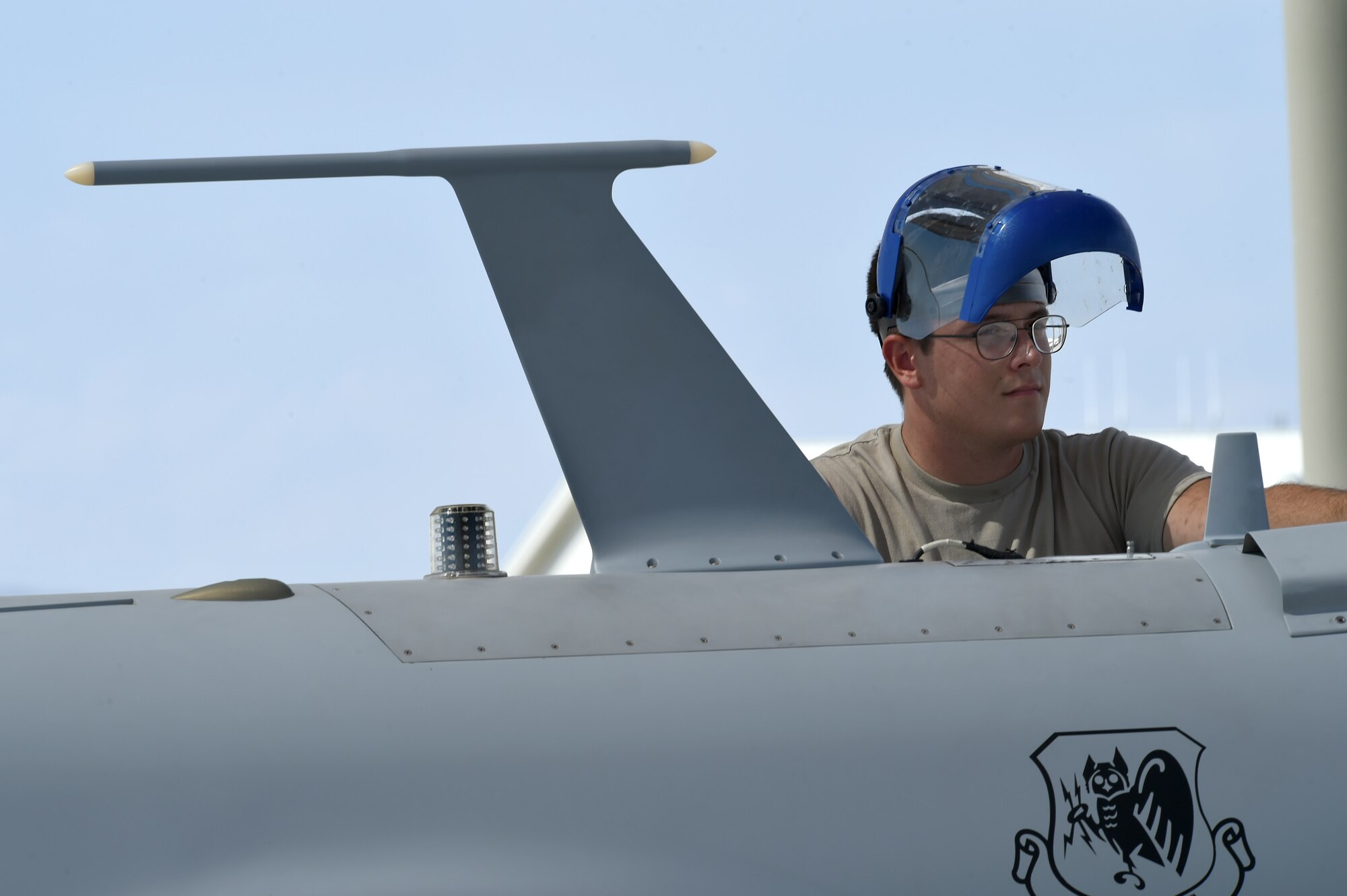 An MQ-1 Predator maintainer assigned to the 432nd Aircraft Maintenance Squadron, Tiger Aircraft Maintenance Unit inspects an MQ-1 Aug. 24, 2016, at Creech Air Force Base, Nevada. Maintainers from Tiger AMU have sustained the MQ-1 airframe at Creech since the early 2000’s, when it was first weaponized to provide armed reconnaissance. (U.S. Air force photo by Airman 1st Class James Thompson)
