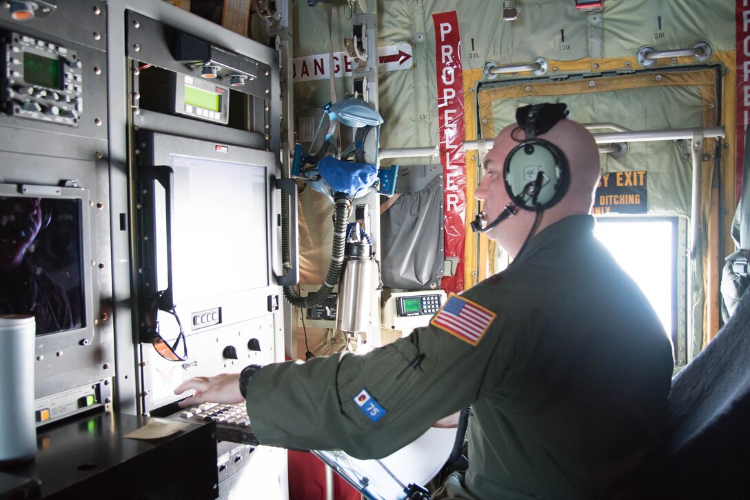 Maj. Tobi Baker, 53rd Weather Reconnaissance Squadron aerial reconnaissance weather officer, watches the radar and analyzes weather data during a flight into Hurricane Hermine Sept. 1, 2016 (U.S. Air Force photo by Senior Airman Heather Heiney)