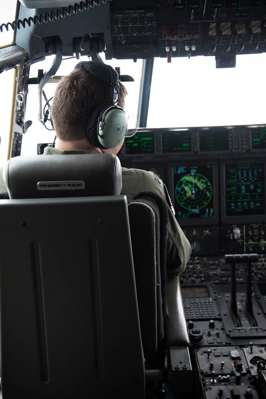 53rd Weather Reconnaissance Squadron pilot looks out the cockpit window during a flight into Hurricane Hermine Sept. 1, 2016 (U.S. Air Force photo by Senior Airman Heather Heiney)