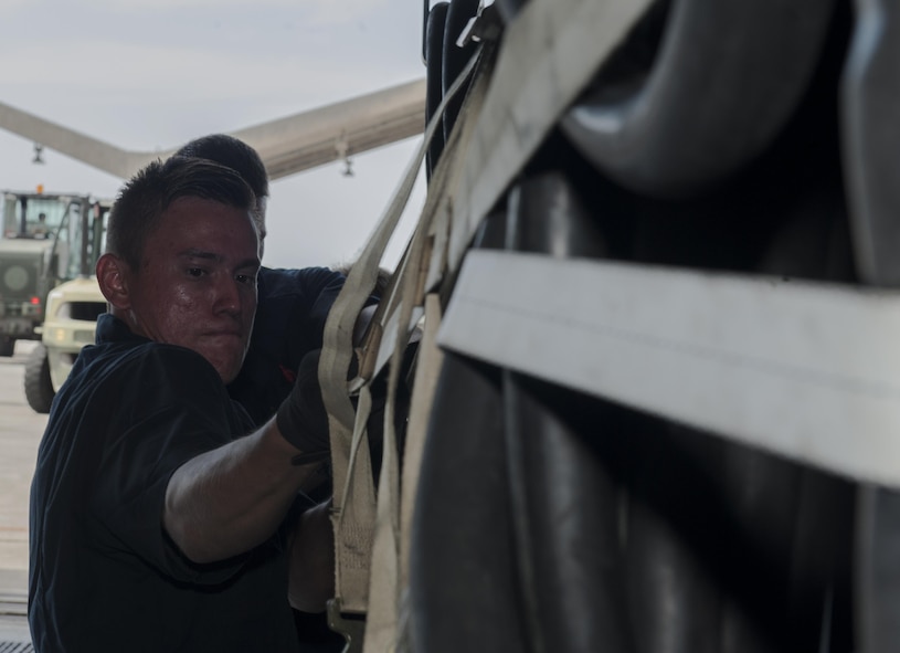 Senior Airman Enrique Leyva, 18th Equipment Maintenance Squadron Aerospace Ground Equipment production support specialist, nets a Trilectron generator Aug. 31, 2016, at Kadena Air Base, Japan. The 18th EMS AGE flight prepared equipment for Exercise Valiant Shield. The equipment was estimated to be worth over five million dollars. (U.S. Air Force photo by Airman 1st Class Lynette M. Rolen)