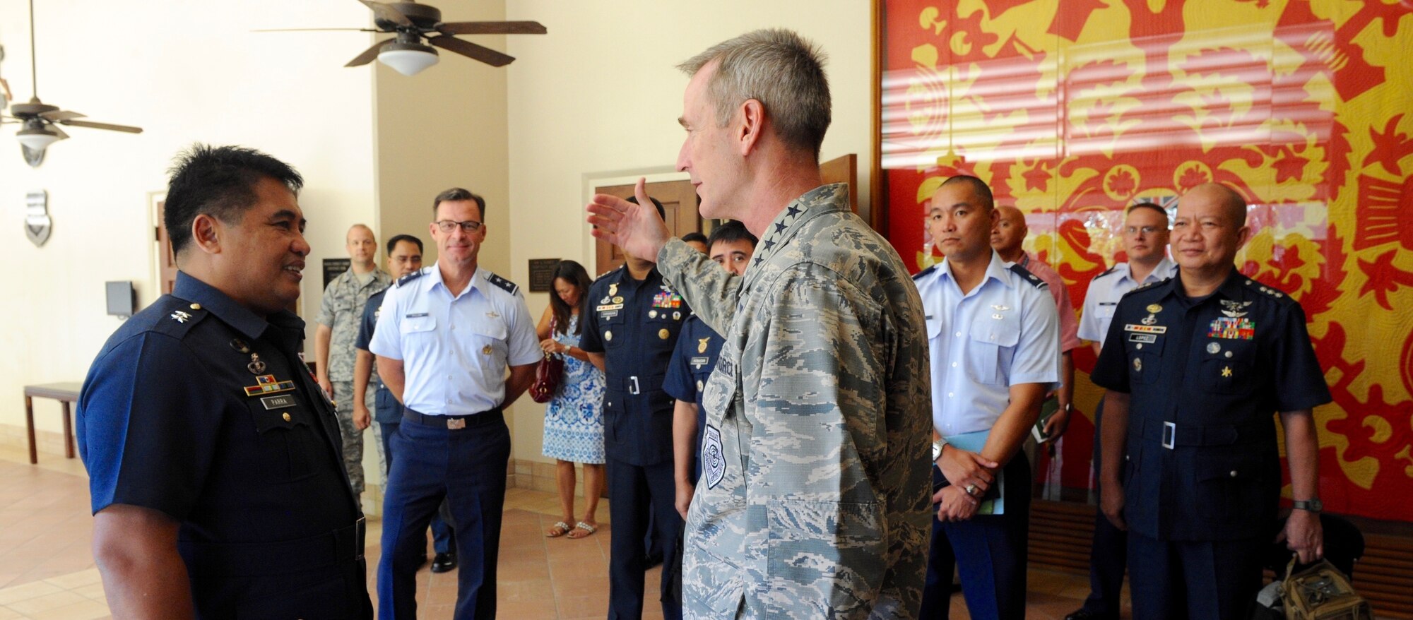 Gen. Terrence J. O'Shaughnessy, Pacific Air Forces commander, right, and Maj. Gen. Conrado V. Parra, Jr., Philippine Air Force vice commander, greet each other during the fifth annual U.S. and Philippine Airman-to-Airman (A2A) Talks at Joint Base Pearl Harbor-Hickam, Hawaii, Aug. 29, 2016.  The three-day A2A talks between Pacific Air Forces and the Philippine Air Force is a forum to plan and discuss future operations, activities and actions (OAA) and strengthen the AF-AF relationship.  The talks are air forces specific enabling dialogue for regional security cooperation in air operations. (U.S. Air Force photo by Staff Sgt. Alexander Martinez)