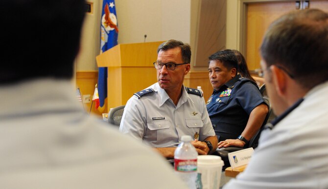 U.S. Air Force Maj. Gen. Mark Dillon, center, Pacific Air Forces vice commander, voices his concerns during the fifth annual U.S. and Philippine Airman-to-Airman (A2A) Talks at Joint Base Pearl Harbor-Hickam, Hawaii, Aug. 29-31, 2016.  The A2A talks between Pacific Air Forces and the Philippine Air Force is a forum to plan and discuss future operations, activities and actions (OAA) and strengthen the AF-AF relationship.  The talks are air forces specific enabling dialogue for regional security cooperation in air operations. (U.S. Air Force photo by Staff Sgt. Kamaile O. Chan)