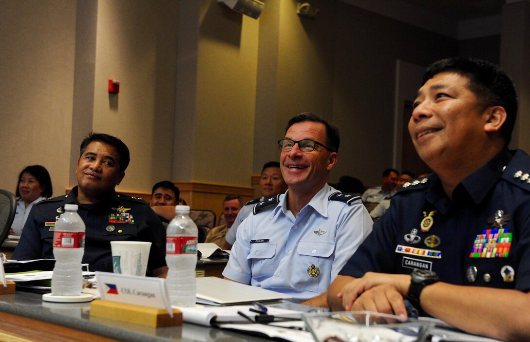 Maj. Gen. Conrado V. Parra, Jr., Philippine Air Force vice commander, left, Maj. Gen. Mark Dillon, center, Pacific Air Forces vice commander and Col. Fermin M. Carangan, Philippine Air Force assistant chief of air staff for operations, participate in briefings  during the fifth annual U.S. and Philippine Airman-to-Airman Talks at Joint Base Pearl Harbor-Hickam, Hawaii, Aug. 30, 2016.  The goals of the three-day conference were synchronizing planning between the U.S. Air Force and Philippine Air Force, shaping engagement priorities, strengthening the bilateral relationship with the PAF and focusing on a 3 to 5 year outlook for PACAF-PAF activities. (U.S. Air Force photo by Staff Sgt. Kamaile O. Chan)