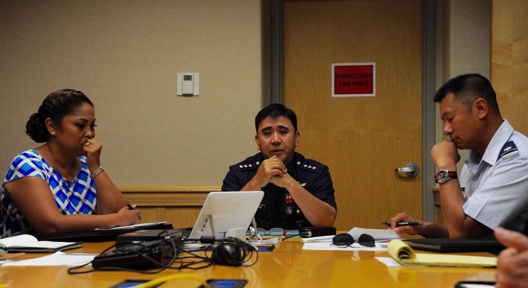 Col. Rene Honasan, Philippine Air Force assistant chief of air staff for logistics, center, and Headquarters Pacific Air Forces members discuss training plans during the fifth annual U.S. and Philippine Airman-to-Airman (A2A) Talks at Joint Base Pearl Harbor-Hickam, Hawaii, Aug. 30, 2016.  The A2A talks between Pacific Air Forces and the Philippine Air Force is a forum to plan and discuss future operations, activities and actions (OAA) and strengthen the AF-AF relationship.  The talks are air forces specific enabling dialogue for regional security cooperation in air operations. (U.S. Air Force photo by Staff Sgt. Kamaile O. Chan)