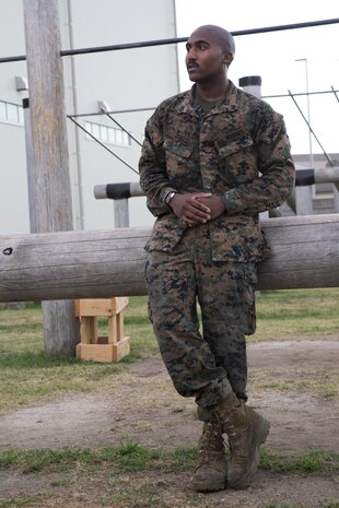 Cpl. Darius Jones, intelligence analyst with Marine Aircraft Group 12, gives a speech to Marines in his shop at Marine Corps Air Station Iwakuni, Japan, Aug. 26, 2016. Jones spoke about leadership as a Marine and overcoming obstacles that get in your way. (U.S. Marine Corps photo by Lance Cpl. Abrego) 
