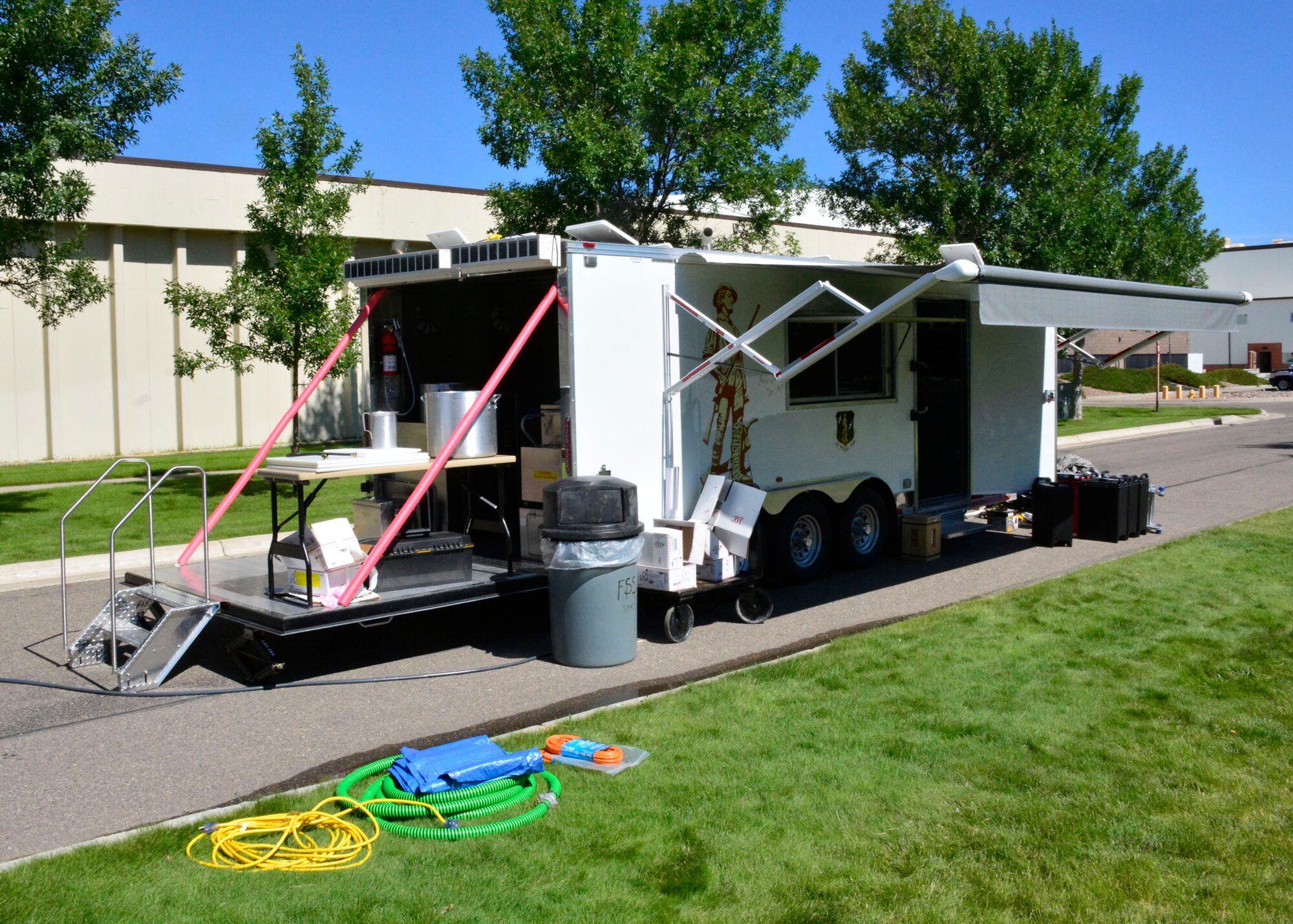 The Disaster Relief Mobile Kitchen Trailer (DRMKT) is set up to serve food during a 120th Airlift Wing guard drill held at the 120th Airlift Wing in Great Falls, Mont. Aug. 13, 2016. 120th Sustainment Services Flight personnel served nearly 400 meals on the day they utilized the DRMKT. (U.S. Air National Guard photo by Senior Master Sgt. Eric Peterson) 