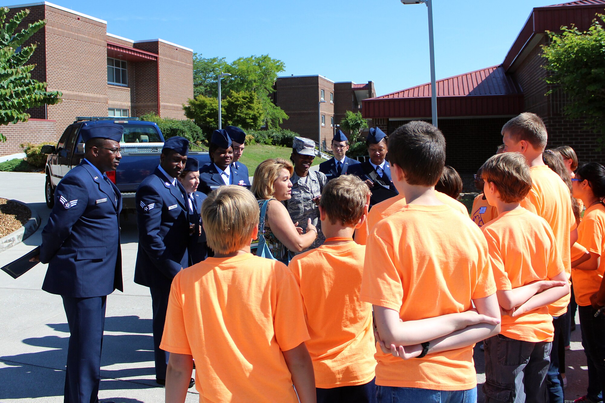Tammie Smeltzer, Professional Continuing Education manager for the I.G. Brown Training and Education Center, speaks to kids in summer camp with the University of Tennessee's Junior Leadership Institute during a visit at the TEC, June 29, 2016, on McGhee Tyson Air National Guard Base in Louisville, Tenn. (Photo courtesy University of Tennessee)