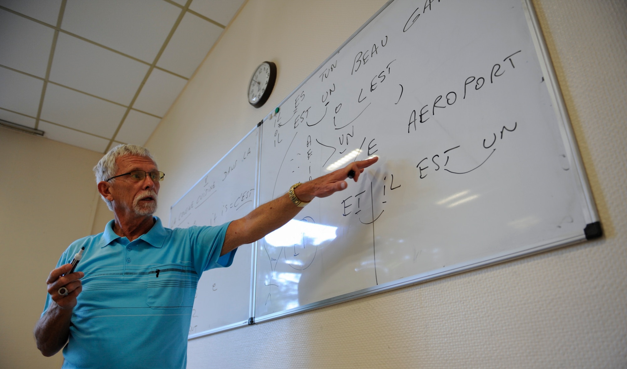 Robert Bels, French course instructor, recites the correct pronunciation of a word during a lesson Aug. 30, 2016, at Ramstein Air Base, Germany. Bels has been a French course instructor with the 86th Force Support Squadron for approximately five years. (U.S. Air Force photo/ Airman 1st Class Savannah L. Waters)