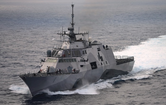 PACIFIC OCEAN – The littoral combat ship USS Freedom (LCS 1) transits alongside the seventh Nimitz-class nuclear-powered supercarrier, USS John C. Stennis (CVN 74). Navy personnel evaluated virtual and hardware representations of the the Stennis strike group’s gun weapon systems, combat systems, and unmanned vehicles integrated with surface and air assets at the 2016 USS Dahlgren demonstration, Aug. 30. The test – made possible by a cybernetic laboratory called USS Dahlgren – proved engagement coordination across the battlegroup and live fire destruction of multiple targets from two combatants utilizing two different gun based systems. “This has been five to six years in the making and couldn't come at a better time as we see real-world events such as the recent small boat incursions in the Middle East, highlighting the need for the Fleet,” said Capt. Brian Durant, NSWCDD commanding officer.