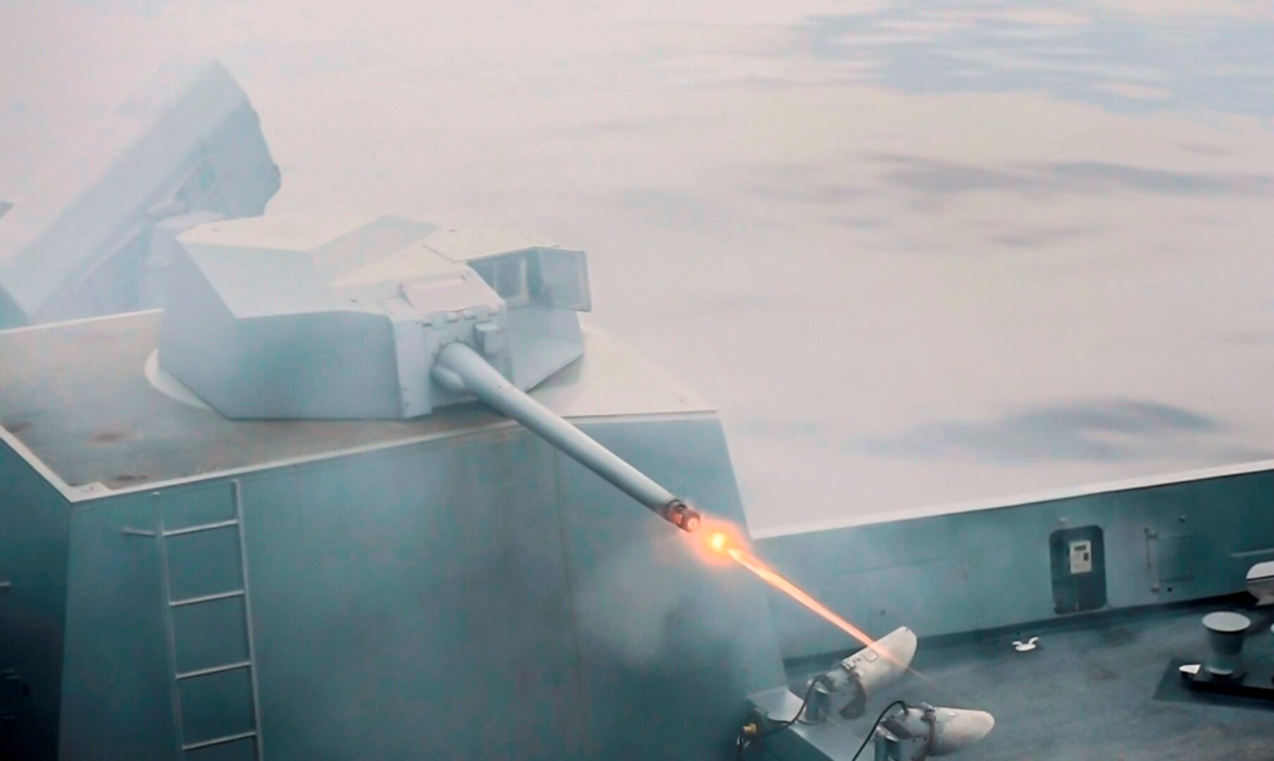 160817-N-XM324-120 
EAST CHINA SEA – The amphibious transport dock ship USS Green Bay (LPD 20) fires a MK-46 30mm gun during a live-fire exercise. Navy scientists and engineers evaluated a strike group’s Aegis combat system and gun weapon systems – including the 30 millimeter gun – as well as unmanned vehicles integrated with surface and air assets at the 2016 USS Dahlgren demonstration, Aug. 30. The test – made possible by a cybernetic laboratory called USS Dahlgren – proved engagement coordination across the simulated battlegroup and live fire destruction of multiple targets from two combatants utilizing two different gun based systems. “This has been five to six years in the making and couldn't come at a better time as we see real-world events such as the recent small boat incursions in the Middle East, highlighting the need for the Fleet,” said Capt. Brian Durant, NSWCDD commanding officer. 