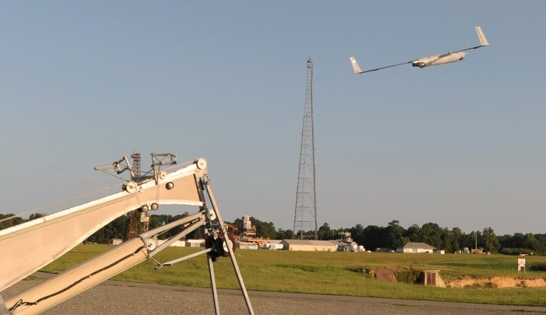 DAHLGREN, Va. - A Scan Eagle unmanned aerial vehicle (UAV) launches from the Naval Surface Warfare Center Dahlgren Division (NSWCDD) Potomac River Test Range, Aug. 30. The Scan Eagle was crucial to the Navy's evaluation of a strike group's gun weapon systems, combat systems, and unmanned vehicles integrated with surface and air assets at the 2016 USS Dahlgren demonstration. The test - made possible by a cybernetic laboratory called USS Dahlgren - proved engagement coordination across the battlegroup and live fire destruction of multiple targets from two combatants utilizing two different gun based systems. 