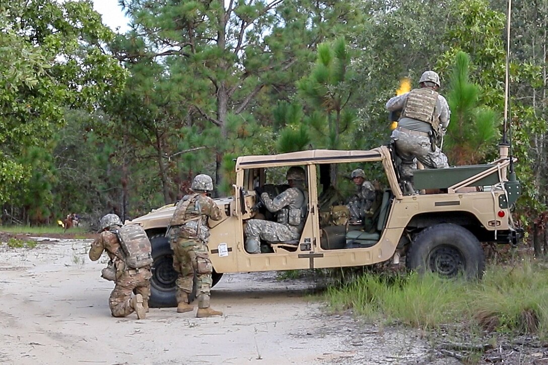 Soldiers return fire while engaging simulated insurgent forces during field training at Fort Bragg, N.C., Aug. 24, 2016. Army photo by Staff Sgt. Jason Hull