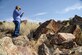 Rupert Steele, of the Confederated Tribes of the Goshute Reservation, takes a photo during a tour of a petroglyph site in Box Elder County, Utah, Aug. 26, 2016. The tour was part of the 2016 Annual American Indian Meeting, an event that provides a face-to-face forum for tribal leaders and federal agencies to discuss tribal concerns on federally managed land. (U.S. Air Force photo/R. Nial Bradshaw)