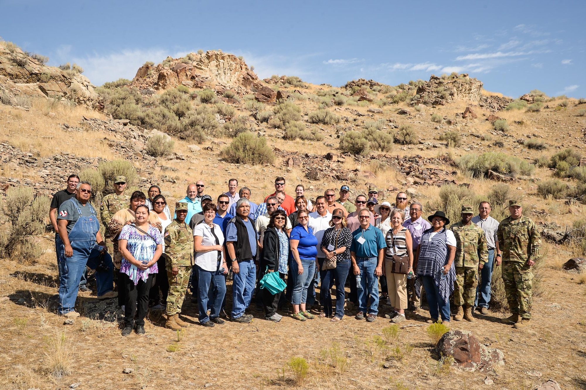 Attendees of the 2016 Annual American Indian Meeting pose for a group photo after a guided tour of a petroglyph site in Box Elder County, Utah, Aug. 26, 2016. (U.S. Air Force photo by R. Nial Bradshaw)