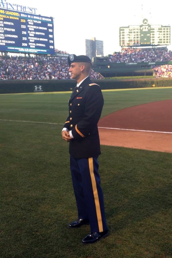 Army Reserve 2nd Lt. Seth Lionberger, Information Management Officer, 85th Support Command, receives a recognition during the Chicago Cubs vs. New York Mets game at Wrigley Field with an audience of more than 41,000 in attendance.
(Courtesy Photo) 