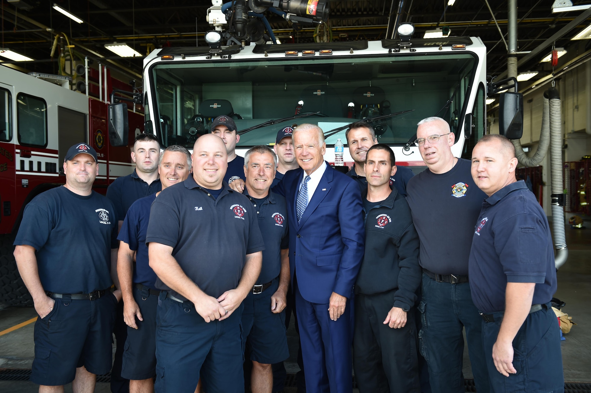 U.S. Vice President Joe Biden poses for a photo with 910th Airlift Wing firefighters here, Sept. 1, 2016. Biden landed here aboard Air Force Two before departing for business in the Valley. (U.S. Air Force photo/Eric White)