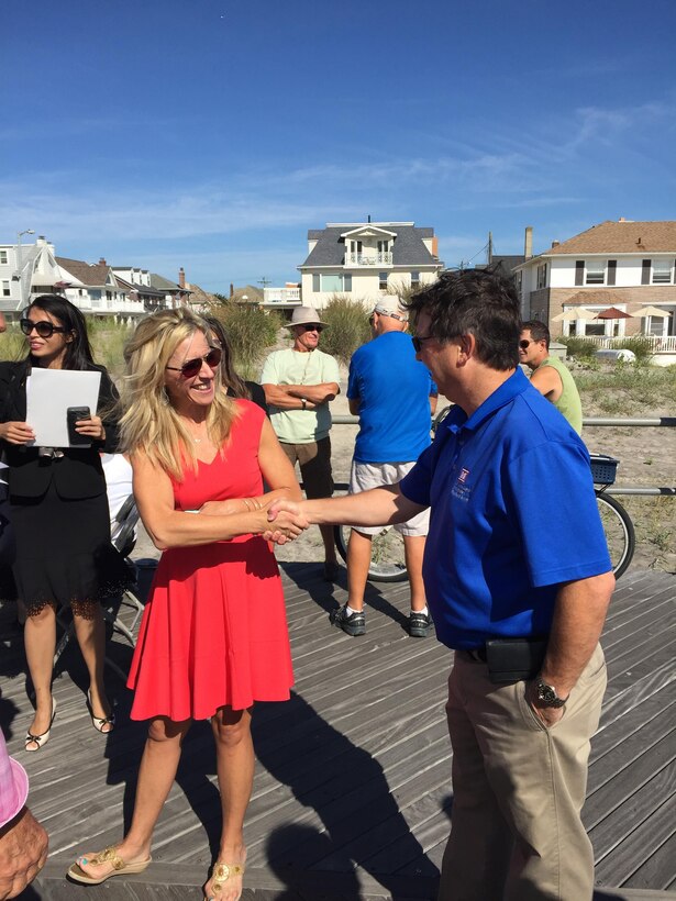 USACE Project Manager Keith Watson (right) spoke with media and citizens during an event in Ventnor City, New Jersey to announce the bid announcement for the Absecon Island contract. The project will complete the dune and berm system in southern Ventnor, Margate City, New Jersey and Longport, New Jersey. 